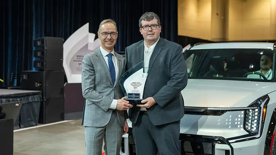 AJAC Award Acceptance Evan Willams with Kia Canada Director of Marketing Michael Kopke