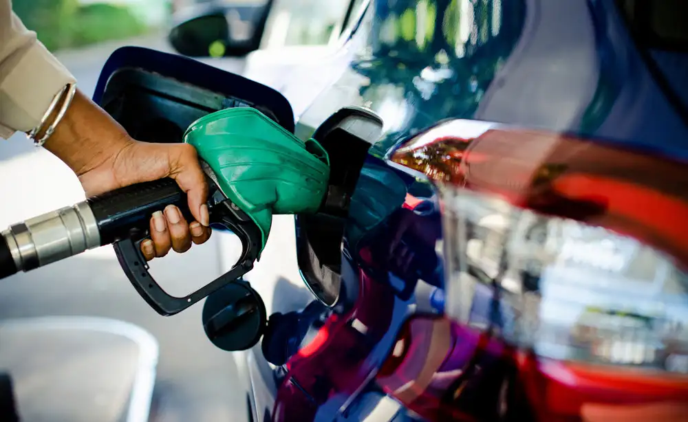 Fleet vehicle being filled up at the gas station.
