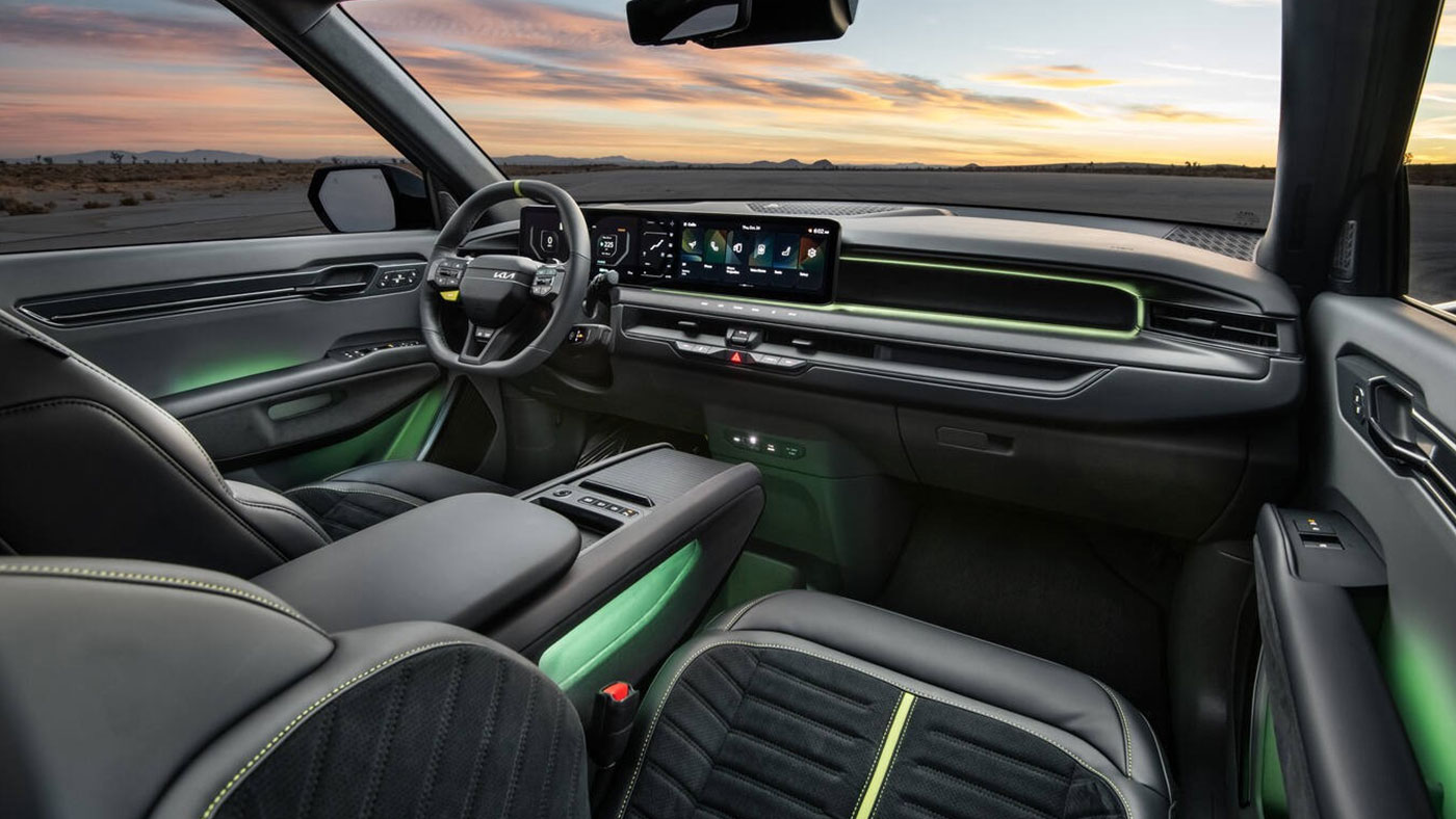 EV9 GT driver-centric interior with Ambient Lighting.