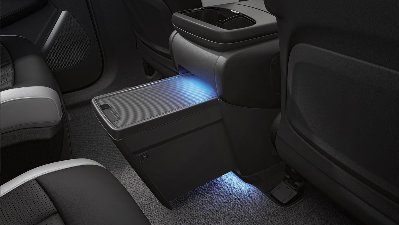 EV9 Land AWD with GT-Line second-row console sliding tray.
