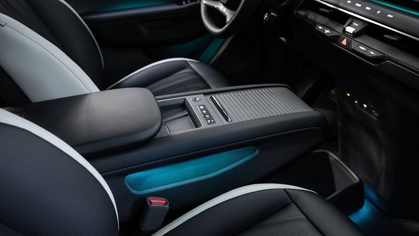 EV9 Land AWD with GT-Line interior center console storage with LED ambient lighting.