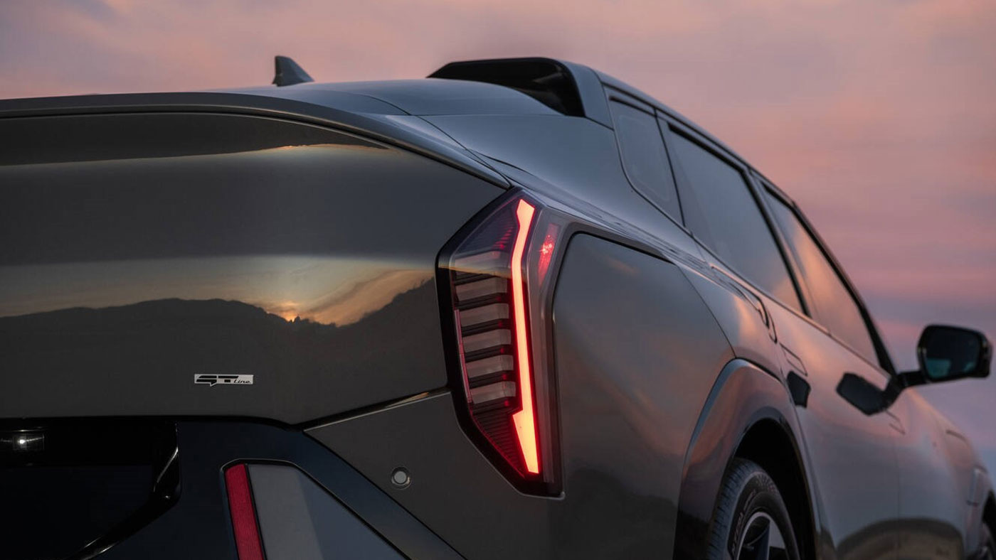 Grey Kia EV4 electric sedan in grey exterior rear lights