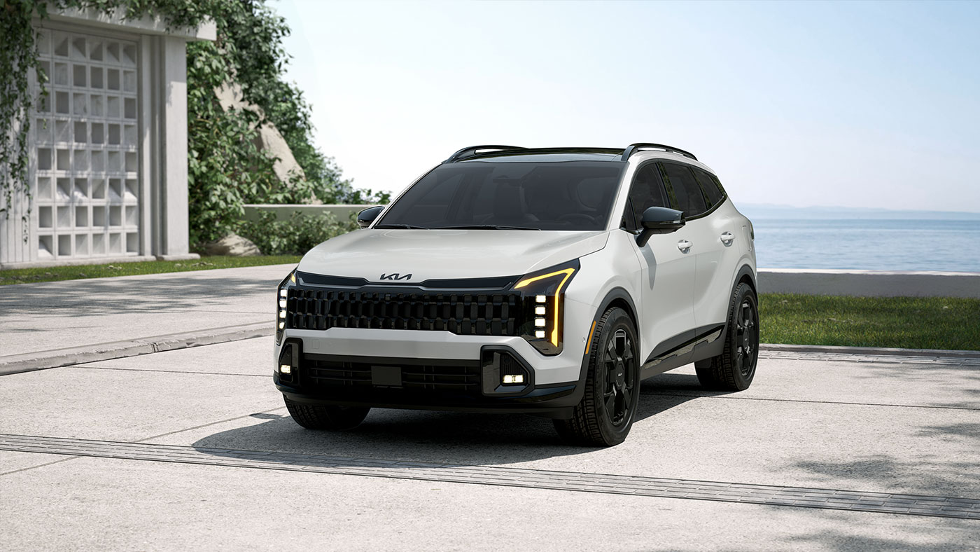 Kia Sportage VUS compact blanc, vue avant extérieure avec phares