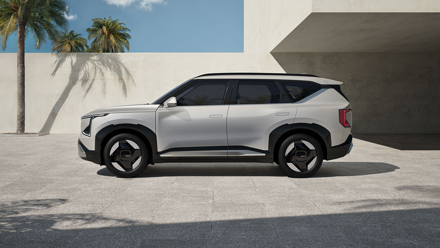 Ivory Silver Kia EV5 electric Compact SUV side exterior