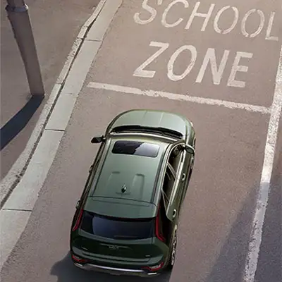 The Niro Hybrid in Cityscape Green with Green Zone Drive Mode for optimal fuel efficiency.