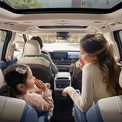 The Kia Carnival with Multi-Zone Voice Recognition technology feature.