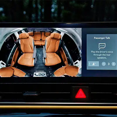 The Kia Carnival’s available Passenger View Monitor technology feature.