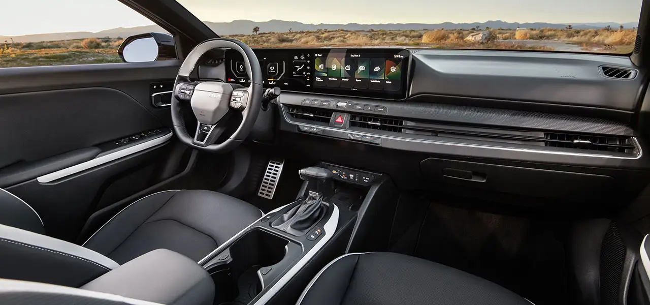 2025 Kia K4 in interior with GT-line sports seats and steering wheel