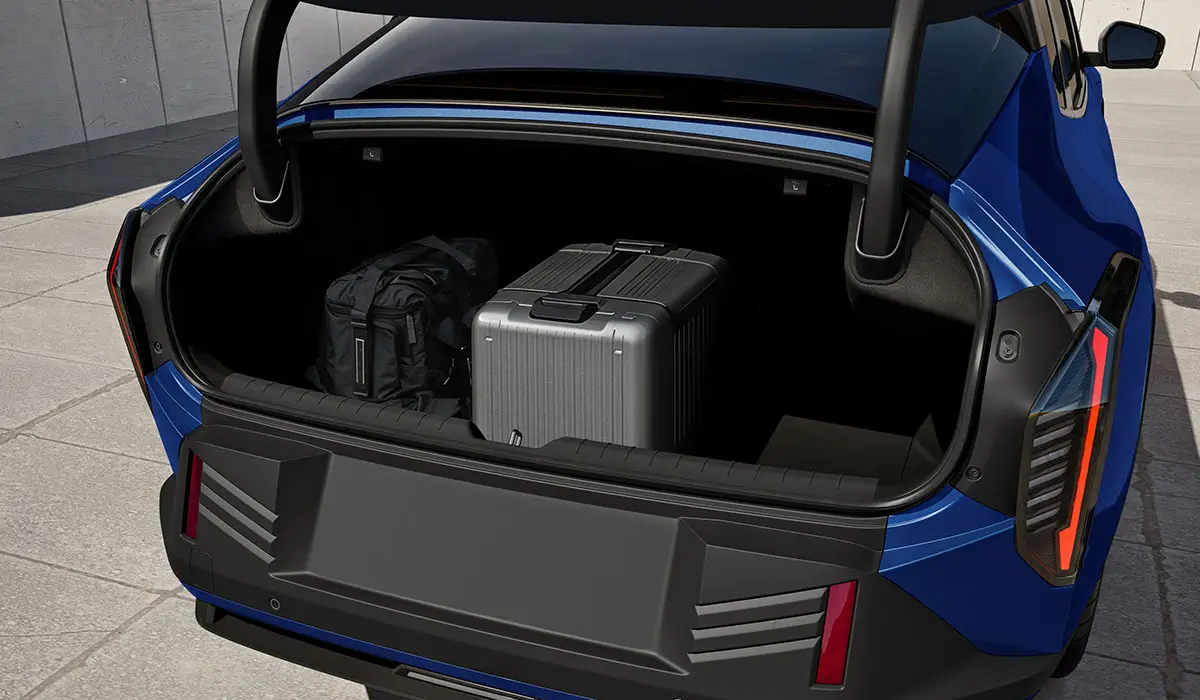 Blue Kia EV4 electric sedan cargo trunk space