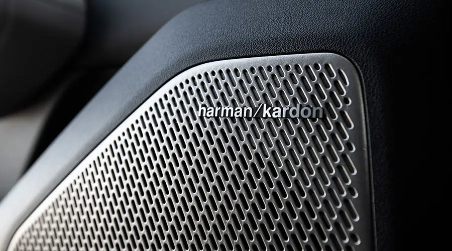 Blue Kia EV4 electric sedan Harmon Kardon Premium Sound System
