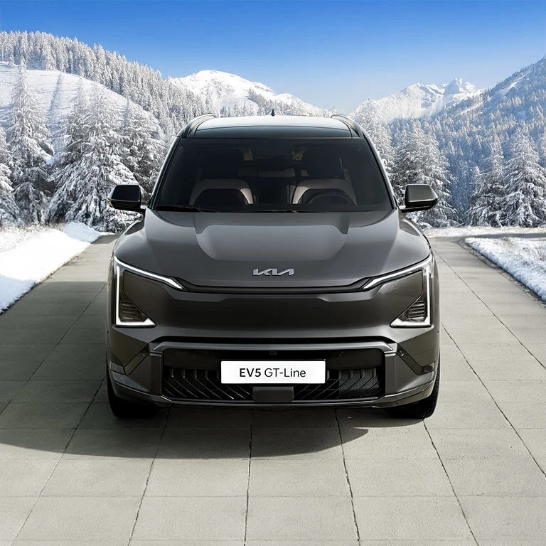 Grey Kia EV5 electric Compact SUV front exterior winter heat pump technology