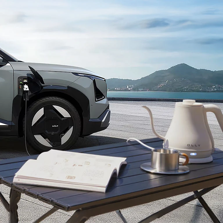 Grey Kia EV5 electric Compact SUV tech feature Vehicle-to-load (V2L)